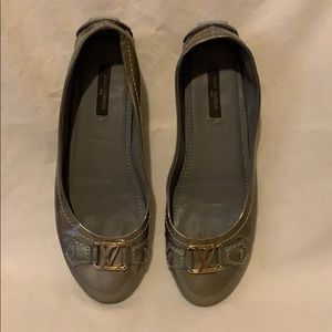 Louis Vuitton patent leather silver ballet flats.